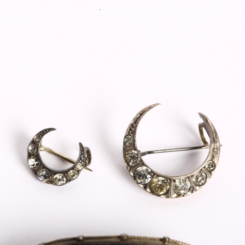 1060 - A silver and Pietra Dura brooch of oval form, and 2 silver and paste set crescent design brooches (3... 