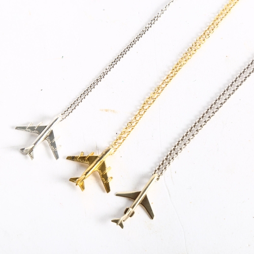 1070 - 3 silver-gilt commercial airline design pendant and chains