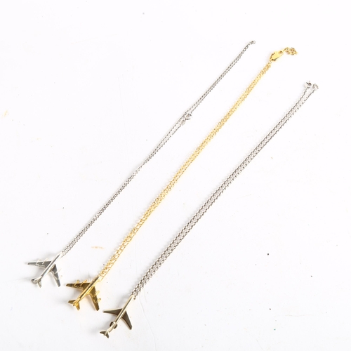 1070 - 3 silver-gilt commercial airline design pendant and chains