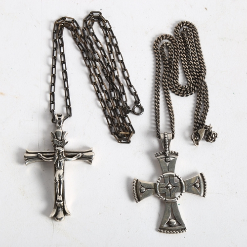 1081 - 2 silver crucifixes and chains