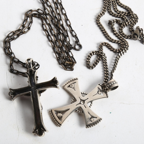 1081 - 2 silver crucifixes and chains