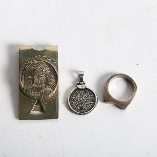 1082 - TAXCO - a Mexican sterling silver money clip, Mexican ring, and a pendant (3)