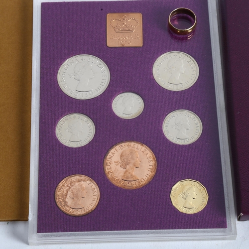 1091 - A 9ct gold wedding band, 3.4g, and a cased set of 1970 Commemorative Coins of Great Britain and Nort... 