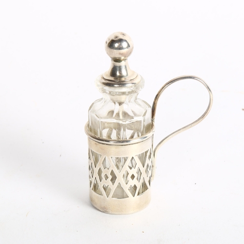 1092 - A small silver overlay scent bottle