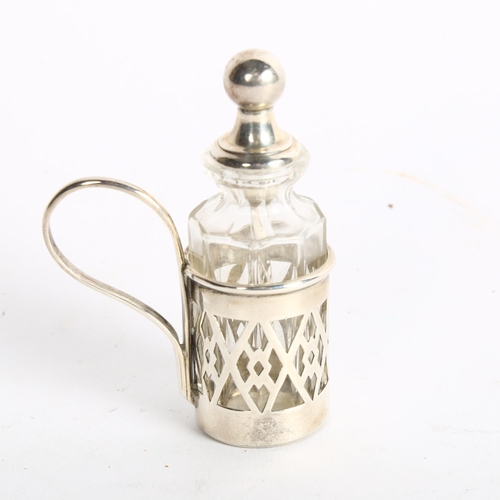 1092 - A small silver overlay scent bottle