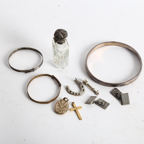 1097 - A group of silver and other jewellery, including a plain form bangle and a christening bangle, cuffl... 