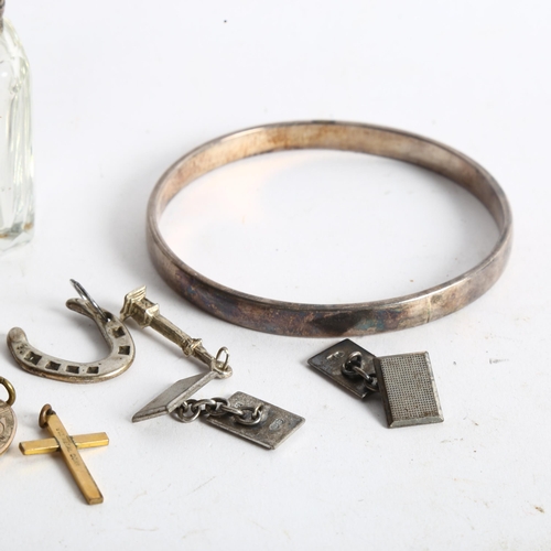 1097 - A group of silver and other jewellery, including a plain form bangle and a christening bangle, cuffl... 