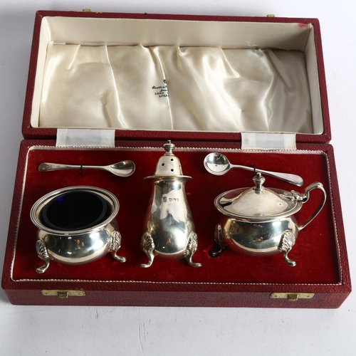 1100 - An Elizabeth II silver 3-piece cruet set, maker's marks for Copper Brothers & Sons Ltd, in original ... 