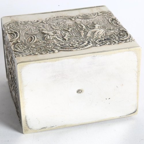 1103 - A decorative silver plated tea caddy, with embossed dancing figure decoration