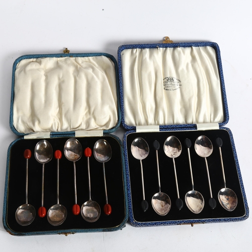 1104 - A cased set of 6 silver bean-end coffee spoons, Birmingham 1931, and a similar silver plated set of ... 