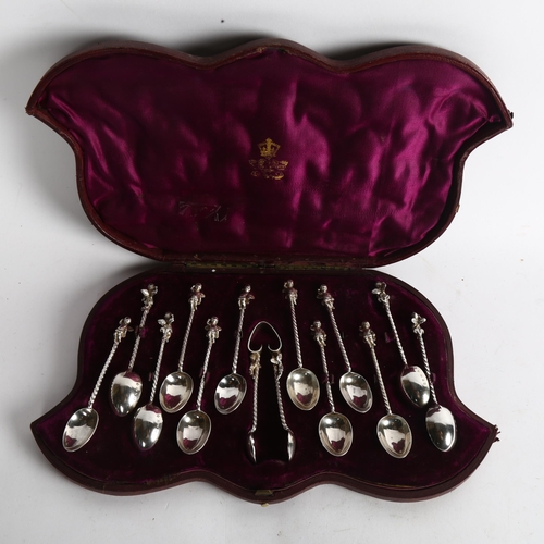 1105 - A cased set of early 20th century silver plated teaspoons, with cherub finials and spiral handles, m... 