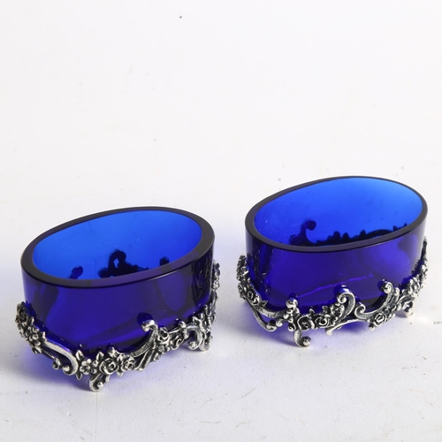 1109 - Pair of Elizabeth II .925 silver-mounted salts, with blue glass liners