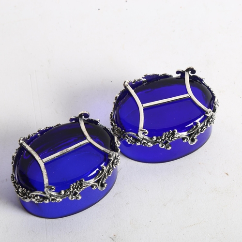 1109 - Pair of Elizabeth II .925 silver-mounted salts, with blue glass liners