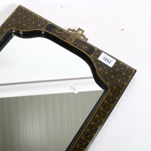 1852 - A Chinese style rectangular black lacquered rectangular wall mirror, 91cm x 36cm