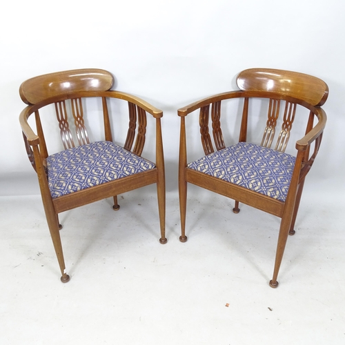 2198 - A pair of Edwardian armchairs on pad feet