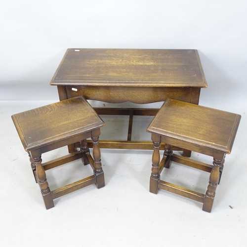 2200 - An oak nest of 3 occasional tables, largest 74cm x 49cm x 40cm