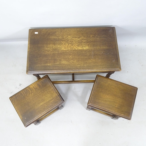 2200 - An oak nest of 3 occasional tables, largest 74cm x 49cm x 40cm