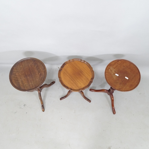 2207 - A pair of mahogany wine tables, H58cm, and another (3)