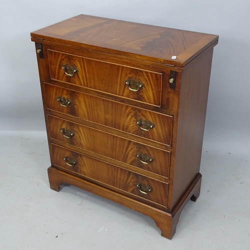 2216 - A crossbanded mahogany bachelor's chest of 4 drawers, with fold over top, on bracket feet, 62cm x 76... 