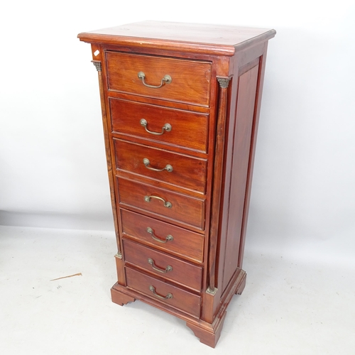 2219 - A reproduction mahogany chest of 7 drawers, with 2 turned pilasters, brass mounts, on bracket feet, ... 