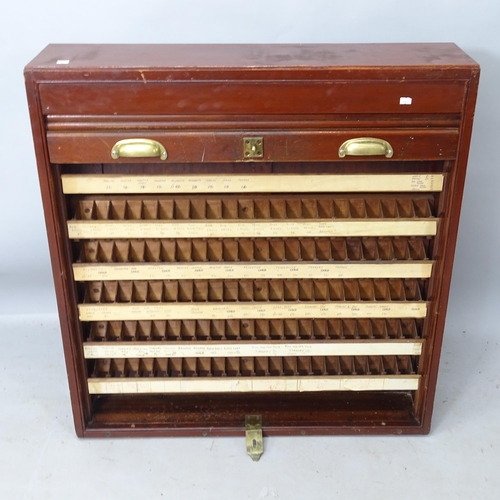 2228 - An early 20th century mahogany tambour-front cabinet, previously used in a Great Western Railway tic... 