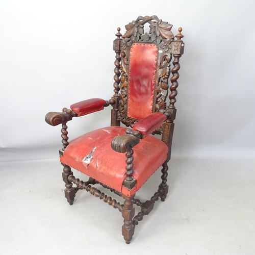 2233 - A 17th century style carved oak and leather upholstered throne chair