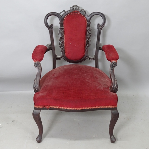 2236 - An Antique ebonised and upholstered open armchair, with carved decoration