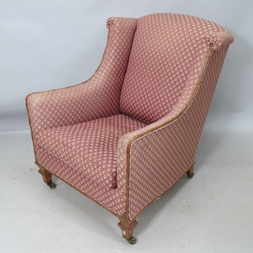 2237 - An early 20th century walnut and upholstered armchair