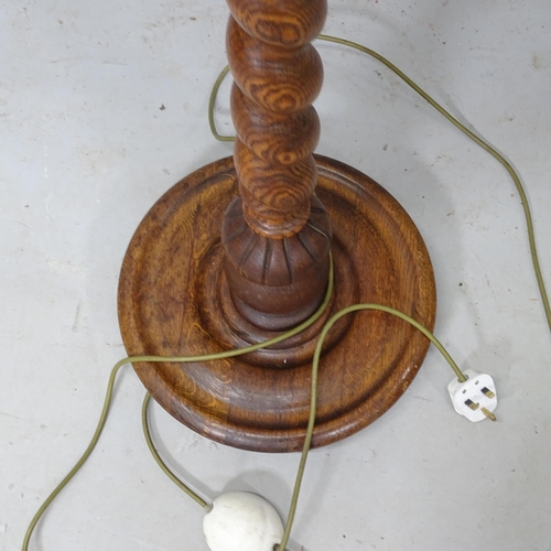 2245 - An oak standard lamp with barley twist column, height to bayonet 150cm