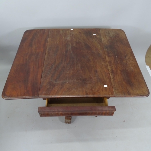 2251 - A Regency mahogany drop leaf breakfast table, with ogee frieze drawer, raised on a turned and fluted... 