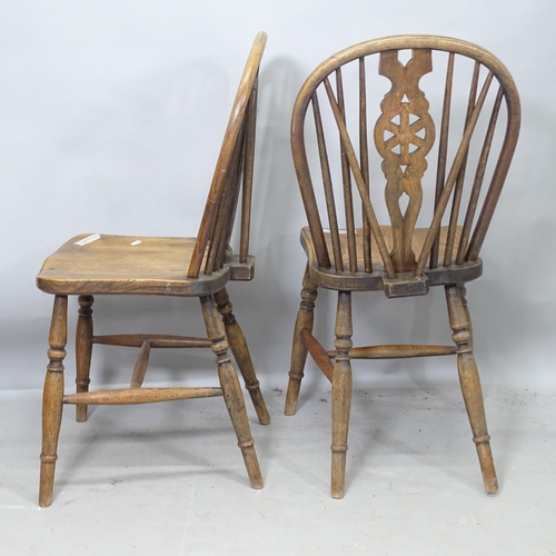 2253 - A set of 4 wheel-back elm-seated dining chairs