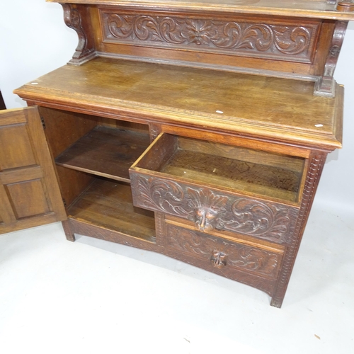 2260 - An Antique oak 2-section dresser, the lower section having a single carved and panelled door and 3 f... 