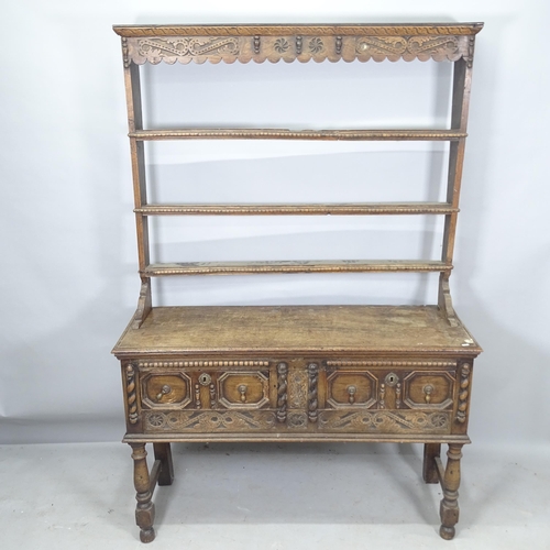 2276 - An Antique oak 2-section dresser, with open plate rack and 2 fitted drawers, with allover carved dec... 