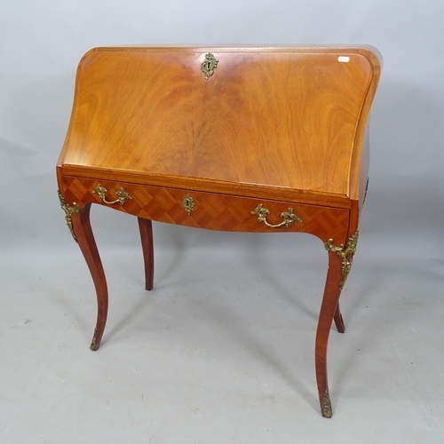 2295 - A reproduction mahogany Continental style bureau, the fall-front revealing a fitted interior, with s... 