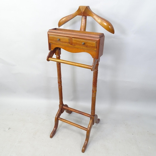 2303 - A mahogany dumb valet stand, 50cm x 124cm x 45cm