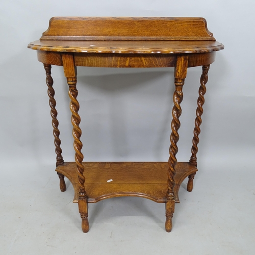 2304 - A 1930s oak 2-tier console table, with raised back and barley twist columns, 78cm x 84cm x 38cm