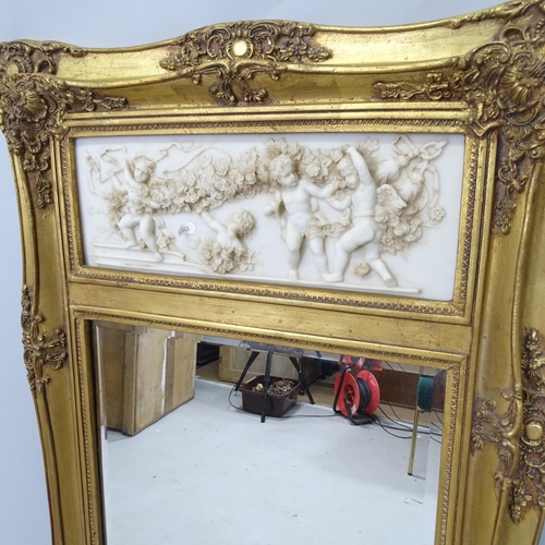 2310 - A framed wall mirror, with inset marble panel, 65cm x 124cm