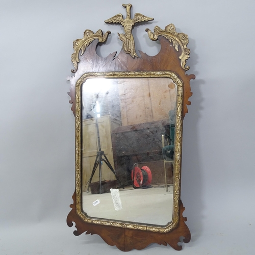 2320 - A Georgian mahogany wall mirror, with carved and gilt painted decoration, 40cm x 78cm