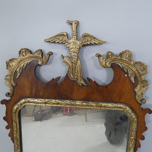 2320 - A Georgian mahogany wall mirror, with carved and gilt painted decoration, 40cm x 78cm