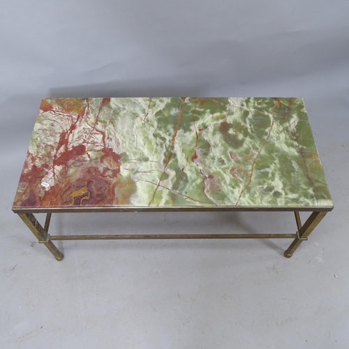 2321 - A rectangular brass-framed onyx-top coffee table, 97cm x 47cm x 46cm