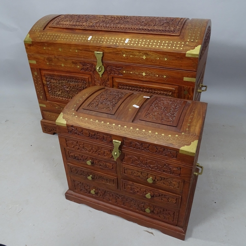 2328 - A large Anglo-Indian hardwood and brass inlaid chest, with allover carved decoration, tray fitted in... 