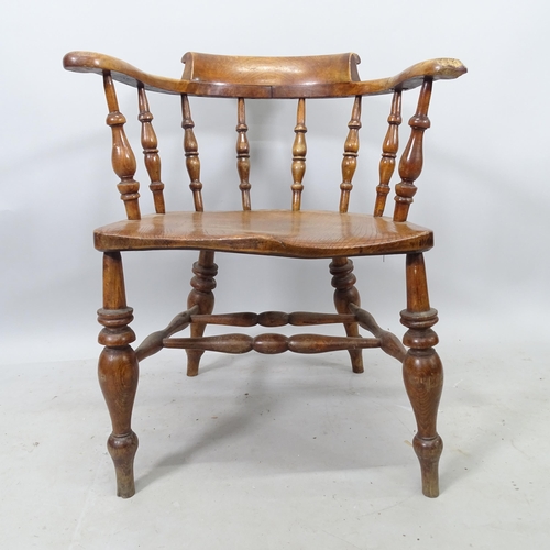 2336 - A 19th century elm-seated smoker's bow-arm chair