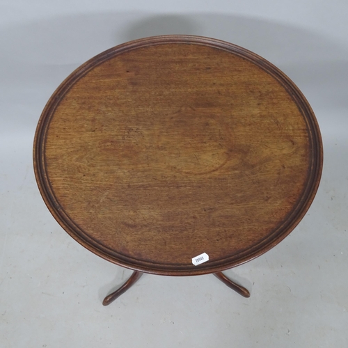 2342 - A 19th century mahogany circular tilt-top occasional table, on tripod base, 50cm x 70cm