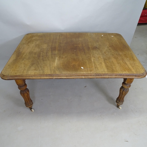 2545 - An Antique mahogany wind-out dining table, with single leaf, max length 140cm x 72cm x 103cm