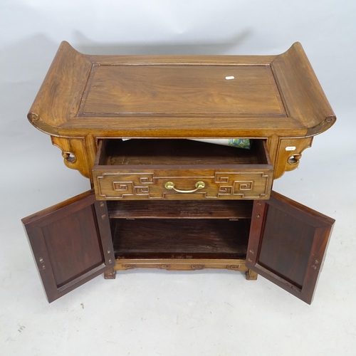 2552 - A modern Oriental hardwood altar table, with a single fitted drawer and cupboards under, 76cm x 80cm... 