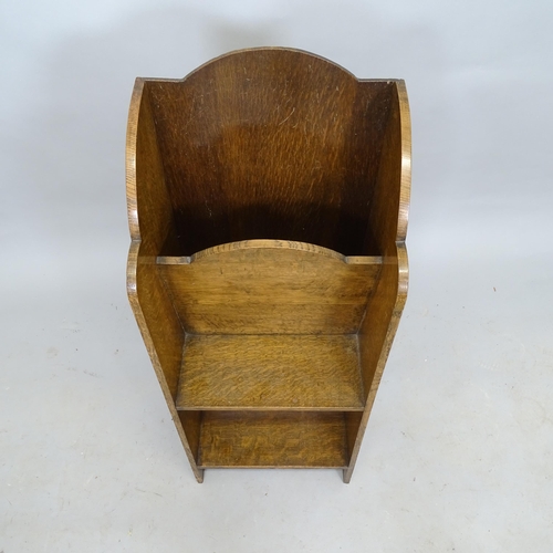 2571 - An early 20th century oak magazine stand, 33 x 85 x 24cm