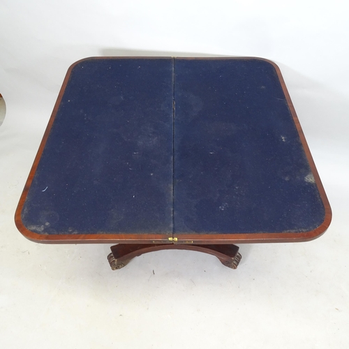 2577 - A 19th Century rosewood fold-over card table, with octagonal central column on platform base, 91 x 7... 