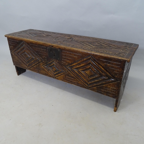 2586 - An Antique carved oak blanket box, 113 x 46 x 34cm