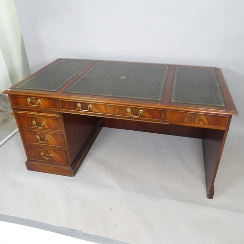 2589 - A reproduction mahogany centre-standing writing desk, with 5 fitted drawers, and 3 inset tooled and ... 