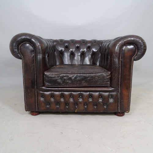 2593 - An Antique brown leather button-back upholstered Chesterfield Club chair, 106 x 70 x 92cm